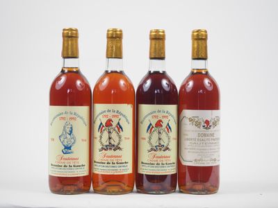 three bottles of wine sitting next to each other on a table