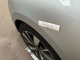 a close up of a car with a sticker on the side of it