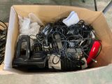a box full of electronic equipment on the ground