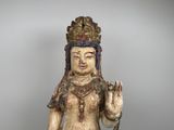an image of a statue of a woman with a crown on her head