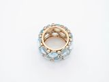 a close up of a ring on a white surface