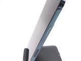 a close up of a cell phone on a stand