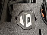a black case with a pair of headphones in it