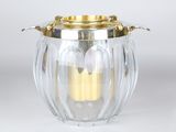 an image of a glass vase with a gold handle on a white background