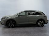 a grey suv is parked in a room with a gray floor