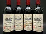 trois bouteilles de vin rouge posées côte à côte sur une table