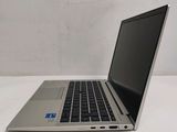 a laptop computer sitting on a table with a white background