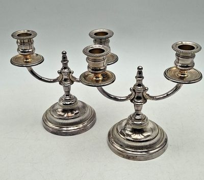 pair of antique silver plated candlesticks