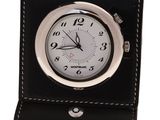 a black leather clock with a white face on a white background