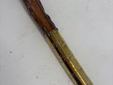a pen that is laying on a table