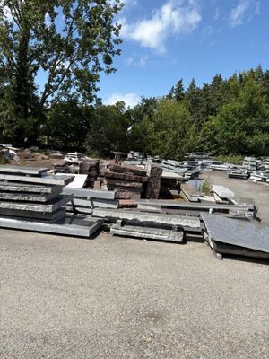 a lot of junk in the parking lot of a parking lot