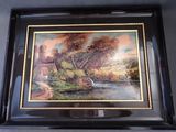 framed painting of a river scene with a waterfall and a bridge