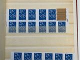 an open book with a picture of a blue and white pattern on it