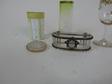three different glass vases sitting next to each other on a table