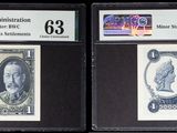 three different types of currency are displayed in a display case