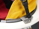 a fireman ' s hat hanging from the back of a fireman ' s helmet