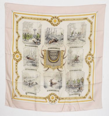 an image of a pink scarf with pictures of people and animals on it