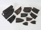 an image of a group of old iron tools on a white surface