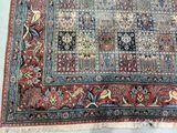 an oriental rug with a variety of different colors and patterns