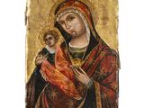 une peinture représentant une femme tenant un enfant dans ses bras
