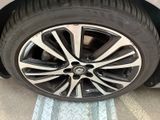 the tire of a car is shown with a flat tire