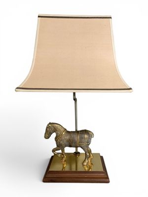 an image of a table lamp with a horse on it