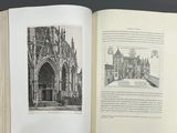 an open book with a drawing of a building on it