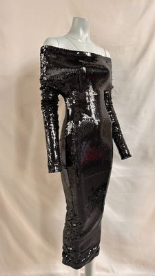 a black sequinized dress on a mannequin mannequin mannequin mannequin mannequin mannequin mannequin mannequin