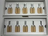 six boxes of perfumes are lined up on a white surface