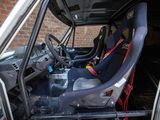 a picture of a car with a seat in the back