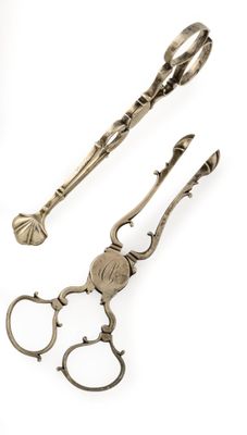 pair of antique scissors on a white background with a white background