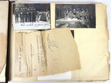 an open book with a bunch of old photos on top of it
