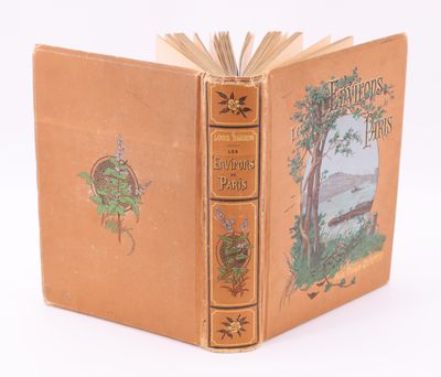 un vieux livre avec l'image d'un arbre dessus