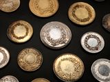 a lot of different types of coins on the table