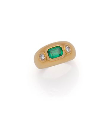 an emerald and diamond ring