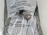 a bag of clothes that has been wrapped in plastic