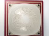 a picture of a light that is on a wall