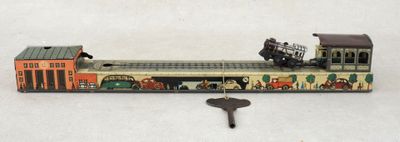 a toy train with a key attached to it