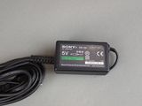 a small charger that is plugged into a charger