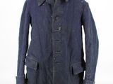 an image of a blue coat on a mannequin stand