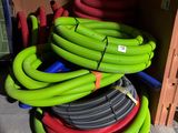 a pile of hoses stacked on top of each other