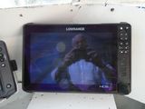 a tablet computer sitting on top of a table next to a camera