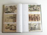 an open book with pictures of people and animals on it