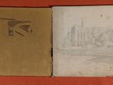 an old book with a drawing of a city on it