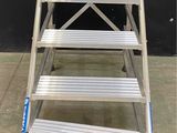 an image of a step ladder with four steps