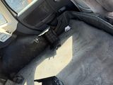 the interior of a car with the front seats down and the front seats down