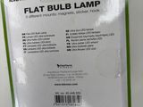 two packages of flat bulb lamps sitting on a table