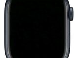 un gros plan d'une Apple Watch avec un cadran noir