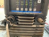 a machine that has a lot of wires attached to it