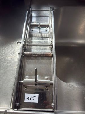 a stainless steel sink with a stainless steel sink underneath it